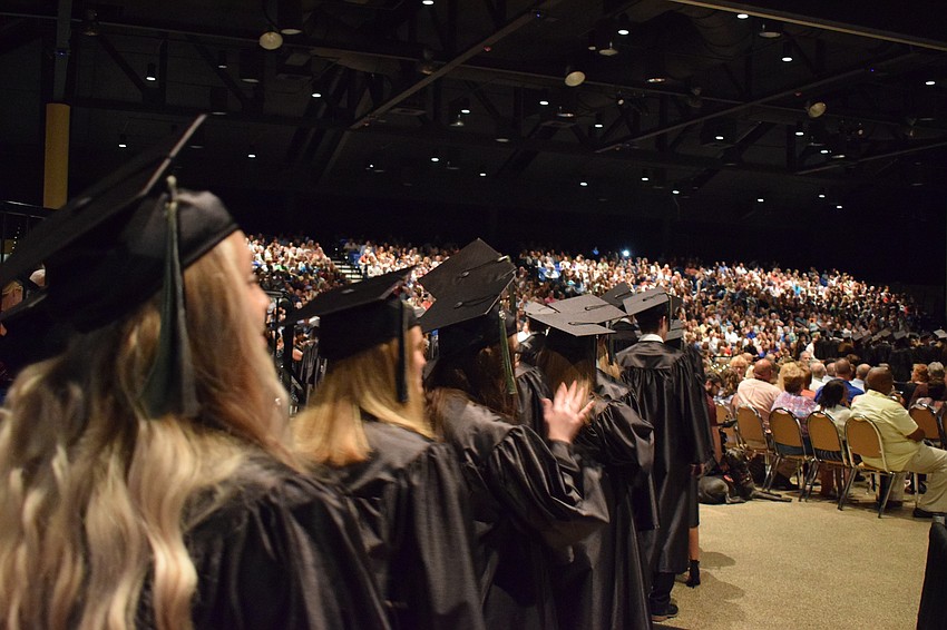 Graduating seniors entered the room, which was packed with friends and family, to the tune of 