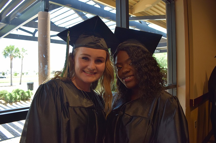 Chloe Sutherland and Dinecia Louisy are ready to get the graduation started.