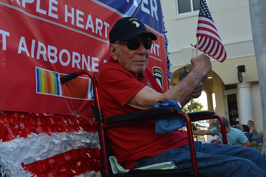 Ninety-five-year-old Robert Kanter, who earned a purple heart with the 101st Airborne Division in World War II, was honored with a float sponsored by his son, Lakewood Ranch Dental owner Michael Kanter.
