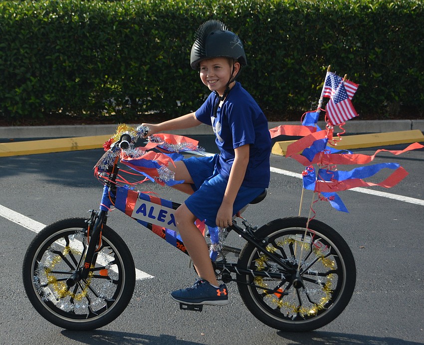 Lakewood Ranch 8-year-old Alexander Miller spent all day getting his bike ready for the parade.
