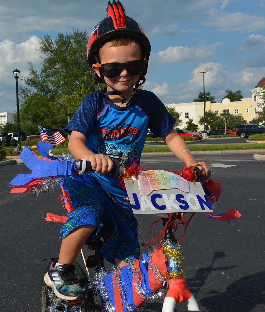 Lakewood Ranch 5-year-old Jackson Miller didn't let the heat bother him when it came to riding his decorated bike.