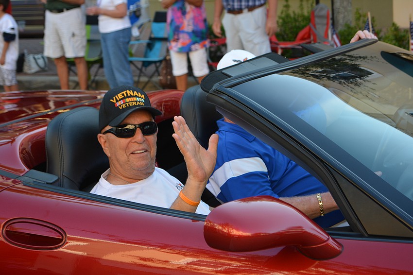 Eagle Trace's Ned Fishman is honored for his service in Vietnam during the Tribute to Heroes Parade.