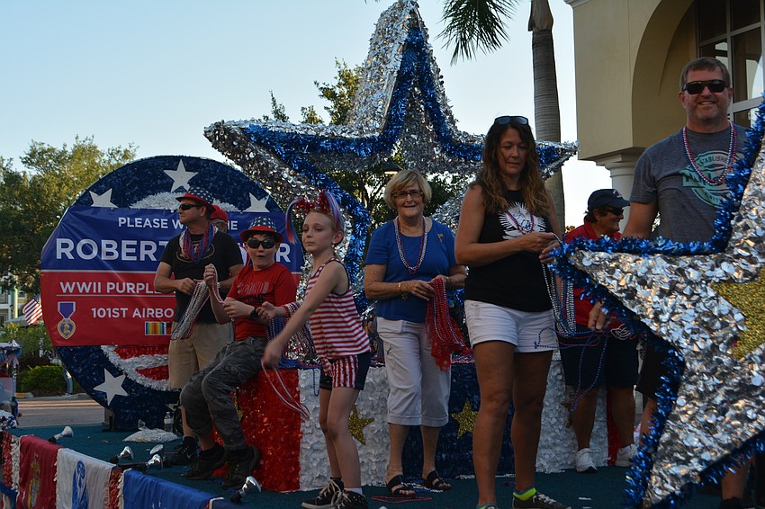 Beads and candy flew off the many floats.