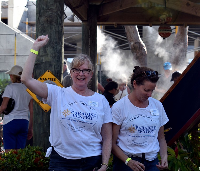 Mary Ann Brady celebrates her hole in one.
