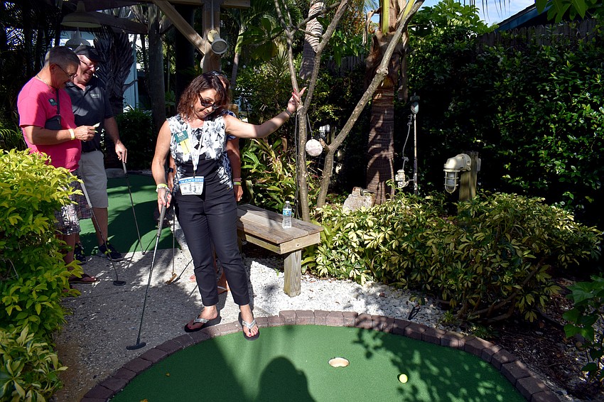 Irina LaRose is annoyed she missed her putt.