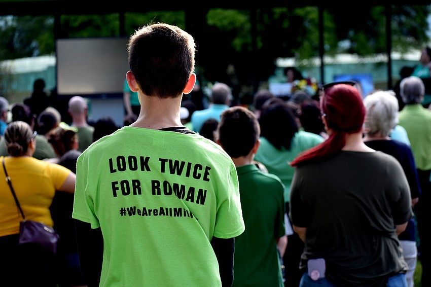 Some members wore shirts reading 