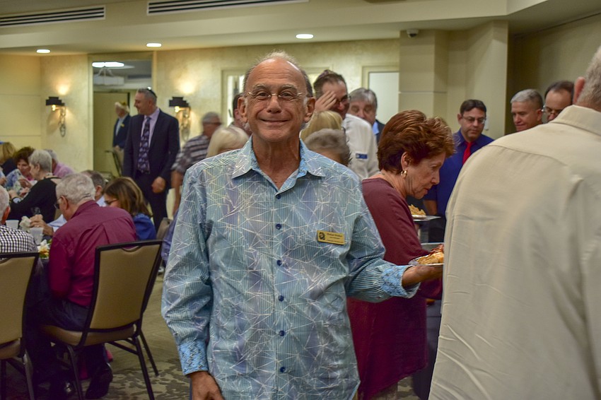 Michael Richker was all smiles at the dinner.