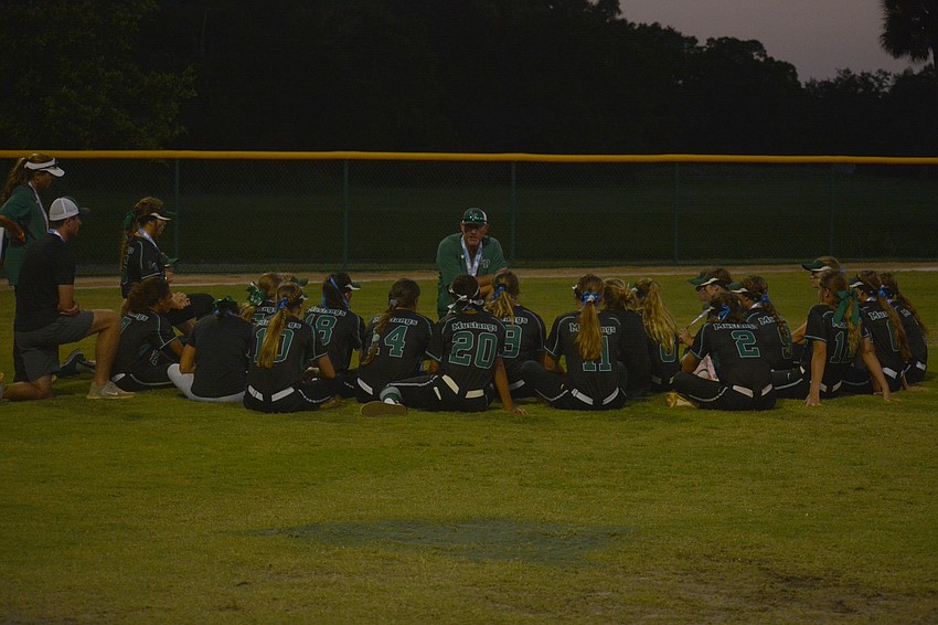 T.J. Goelz talks to his team following the Mustangs' 3–0 loss to Winter Springs.