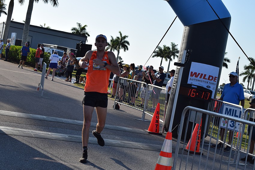 Sarasota's John Rohr was first to the finish in the 5K portion.