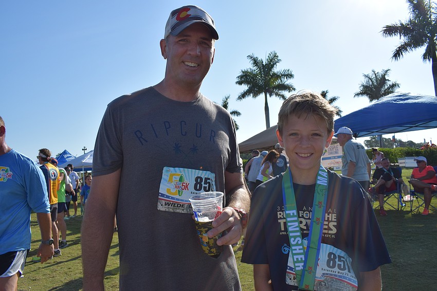 Siesta Key's Sean Omeara ran with his son, Finn, in the race.