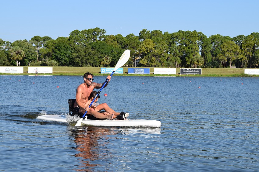 Ramesh Haytasingh, of Sarasota, paddled with his son, Elijah.