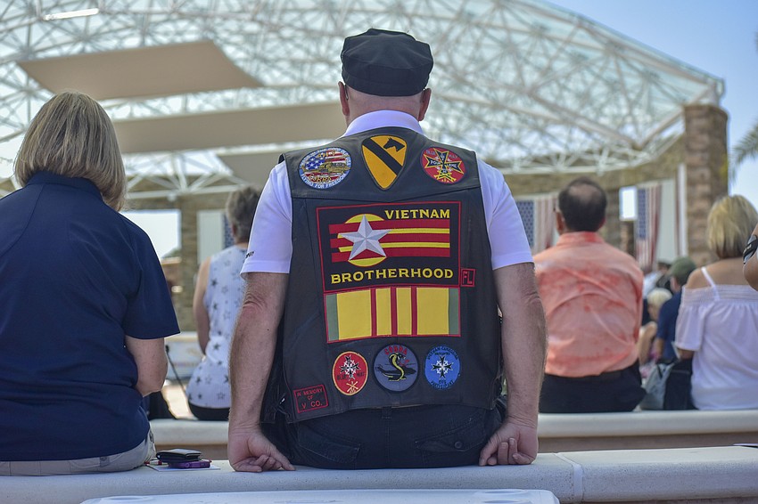Veterans wear vests that signify their time serving.