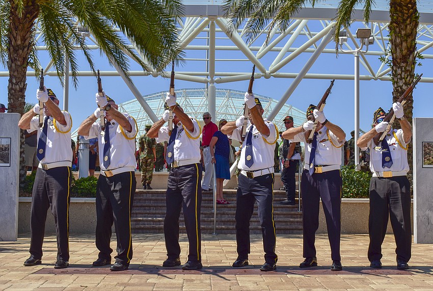 Members of the Venice American Legion Post 159 give the 21-gun salute.