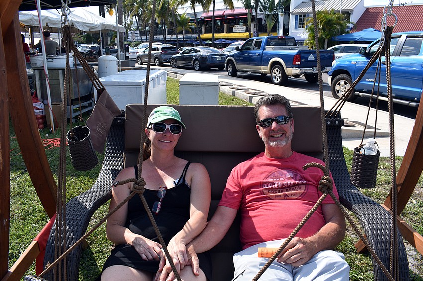 Ivy Hummon and Chuck Bates took a break from the heat.