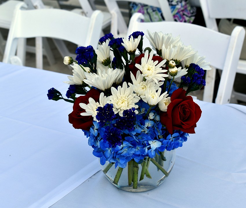 Red, white and blue flowers decorated the tables.