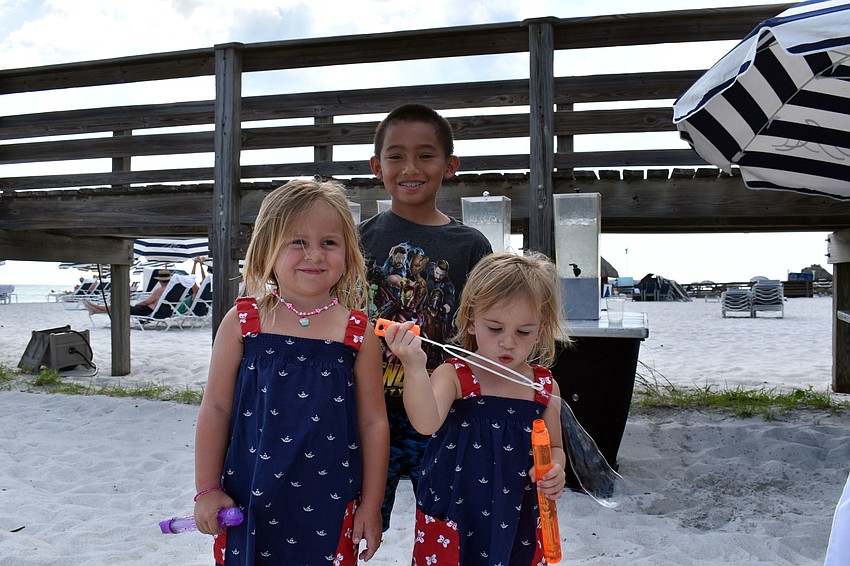 Sawyer and Gavin Germain were all smiles, but Emily Germain couldn't be torn away from her bubbles.