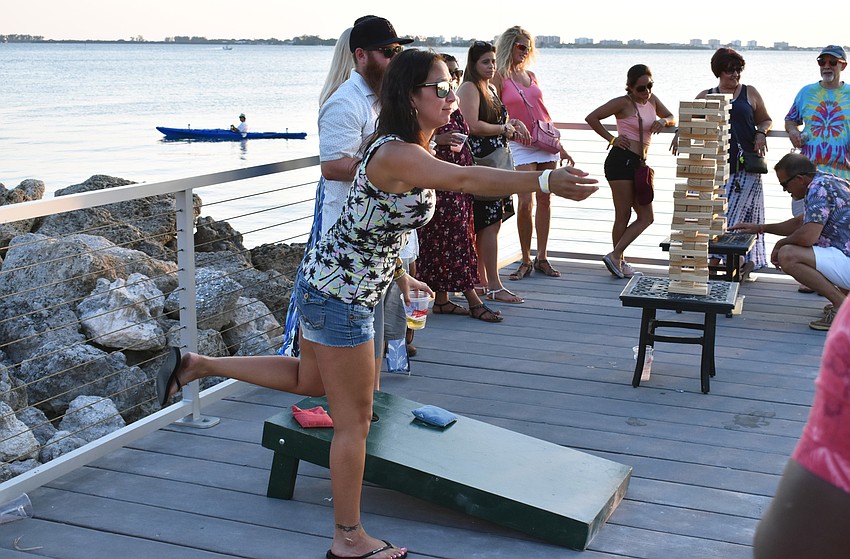 Bianca Dempsey plays cornhole.