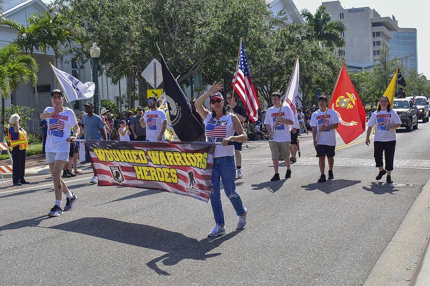 Members of Wounded Warrior Project march in the parade.