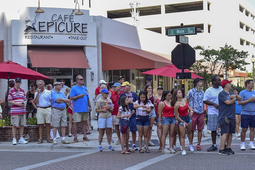 Parade watchers line up on Main Street.