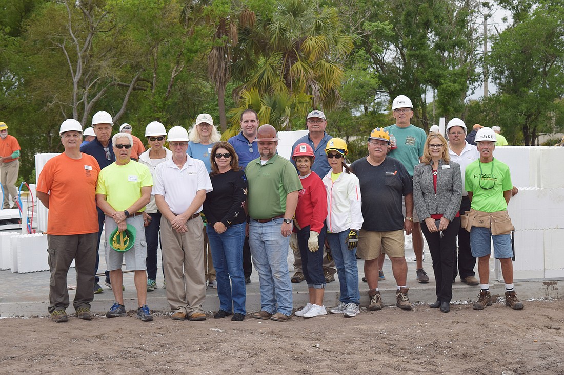 The Day 1 crew on the building site. Includes Stock Signature Homes and Lake Club volunteers as well as Habitat volunteers and staff.
