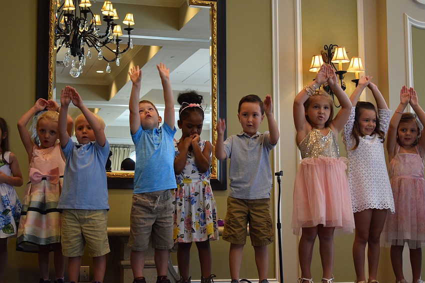 The preschool graduates sang 