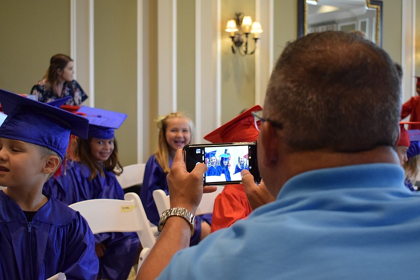 Bridgewater's Brent Hamilton took a picture of his daughter, Reese, in her cap and gown.