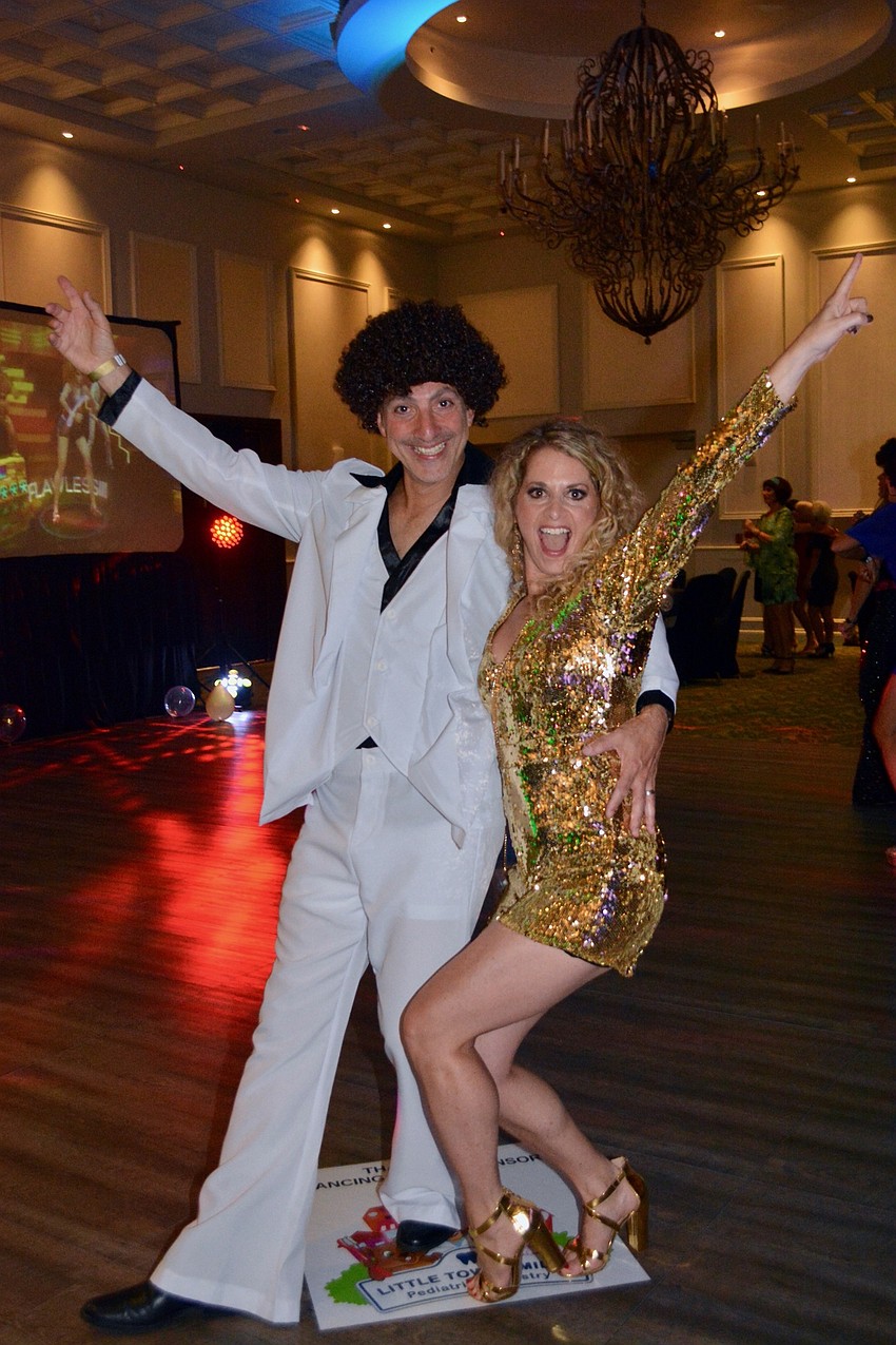 Jaime Marco an her husband David hit the dance floor