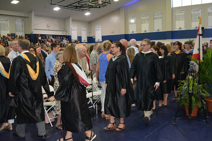 The ODA faculty members take their seats at the beginning of the ceremony.