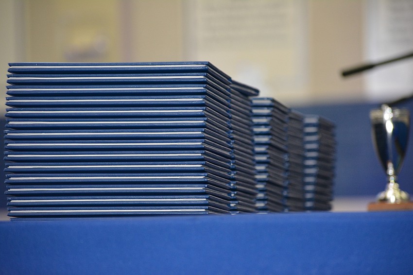 The diplomas were stacked up and ready to go.