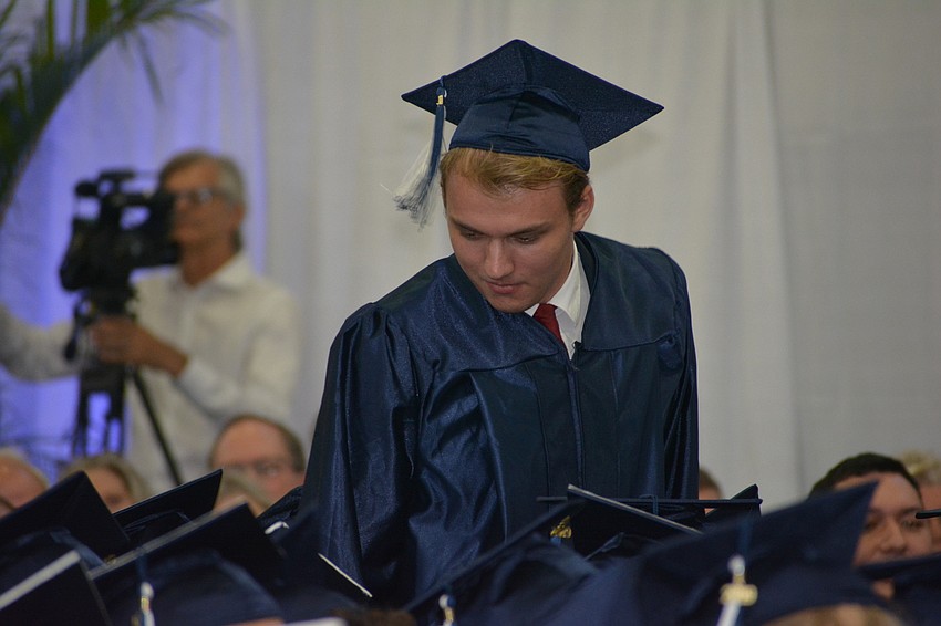Filip Svoboda rises to claim the Achievement Award.