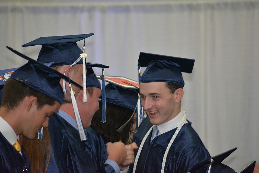 John Floersheimer (right) is congratulated for winning the Faculty Cup.