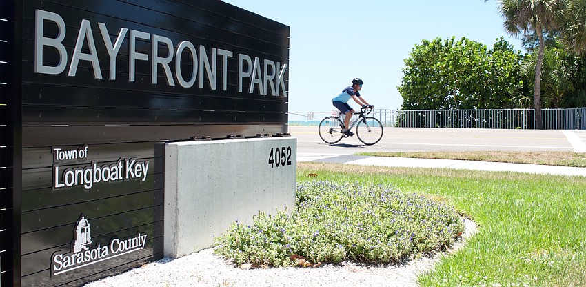 A signalized crosswalk leads from the park's southern parking lot, across Gulf of Mexico Drive to a beach access point.