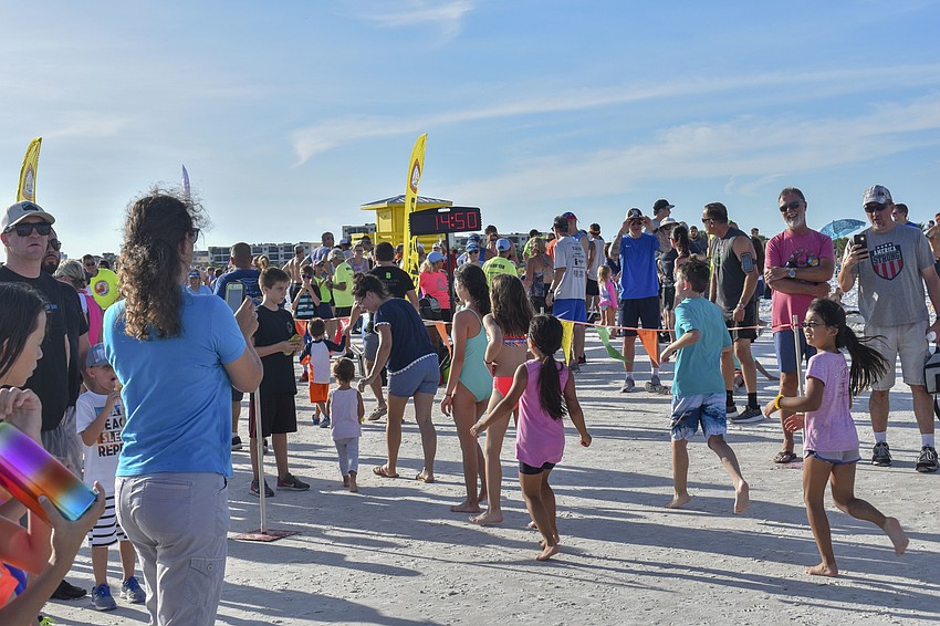 The last few runners complete their race.