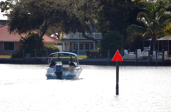 Even during the fall and winter, town officials recommend keeping fertilizer 10 feet from waterways.