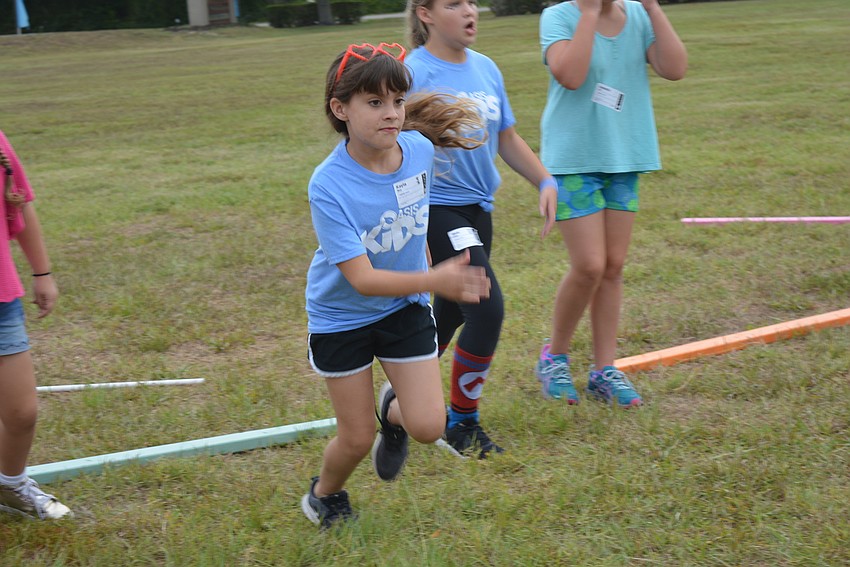 Ten-year-old Lakewood Ranch resident Kayla Boy plays dodgeball against the boys on her Yelping Yoshi team.