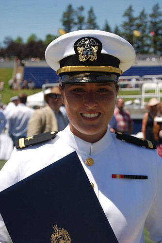 Braden River High graduate Paige Krumwiede holds her U.S. Naval Academy diploma on graduation day May 24.