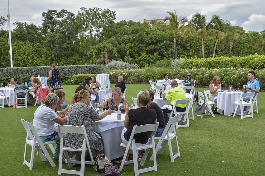 Members from the Siesta Key, Longboat Key and Anna Maria Island Chamber of Commerce network at the Tri-Chamber Business and BBQ on the Bay.