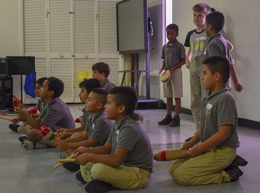 The second grade class perform 