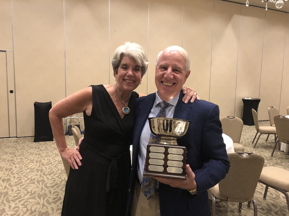 Robin Spagnola poses with her husband, Carmen Spagnola, who earned the Rotary Club of Lakewood Ranch&#39;s Stephen J. Garber Award. Courtesy photo.