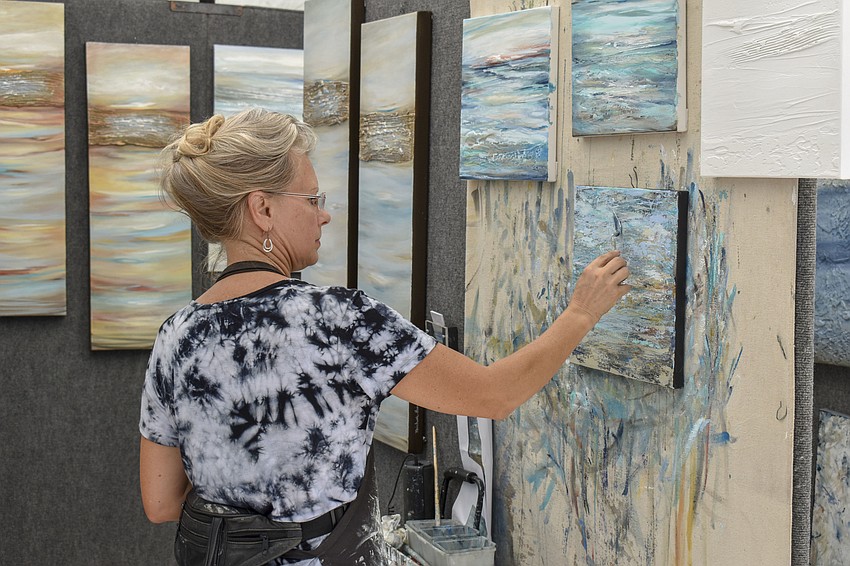Michelle Hinz uses dimensional acrylic texture painting to create a beach-like scene.