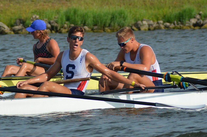 Sarasota Crew's Julian Wilberding and Alexander DeGrado catch their breath after a second-place finish in men's 8+.