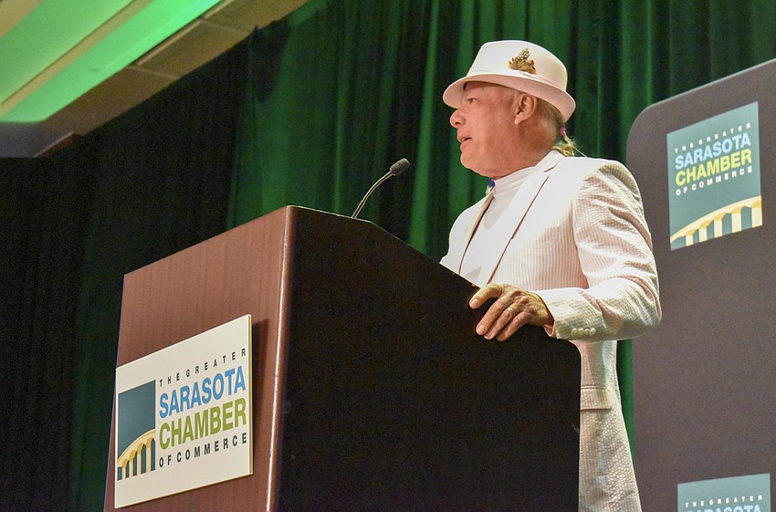 Les McCurdy of McCurdy's Comedy Theatre emcees the ceremony.