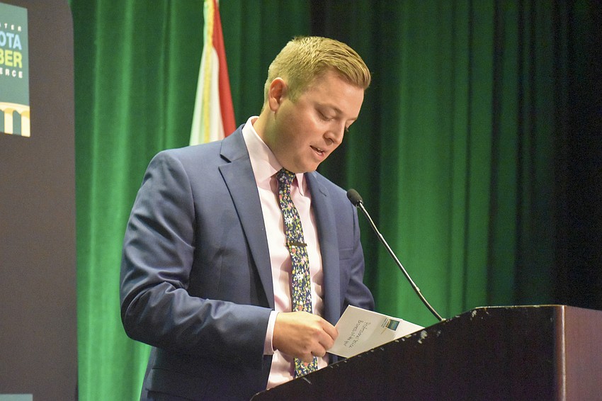 Andy Guz, CEO of Lakewood Ranch Medical Center CEO, announces Professional Services Business of the Year.