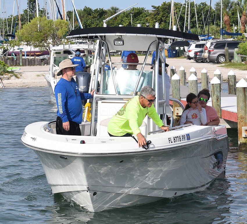 A boat heads off into Sarasota Bay as part of the Seagrass Survey.