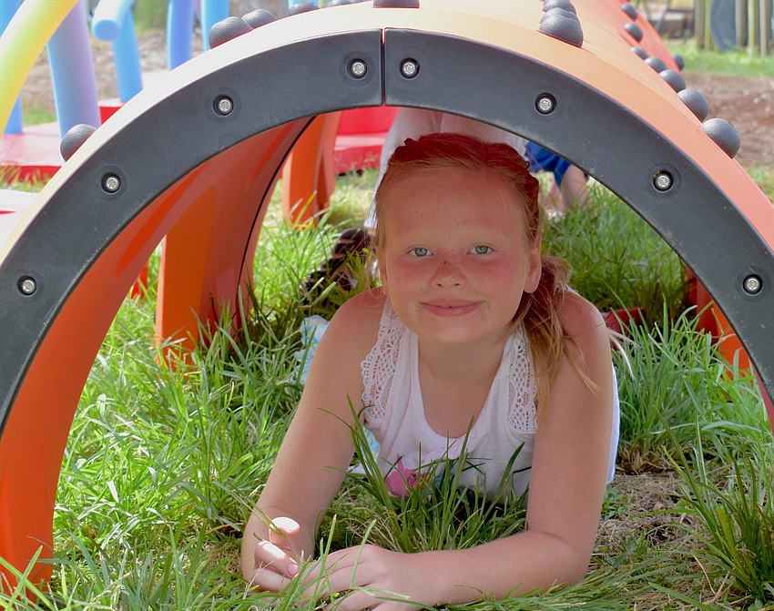 Isabella Arnett, 8, tried out the play zone.