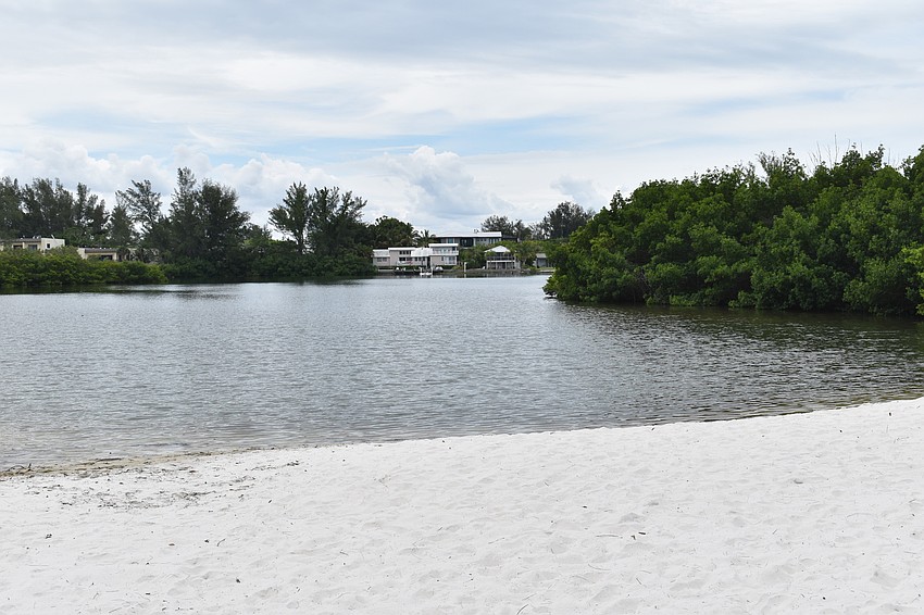 A lagoon is formed  just steps from the Gulf of Mexico.