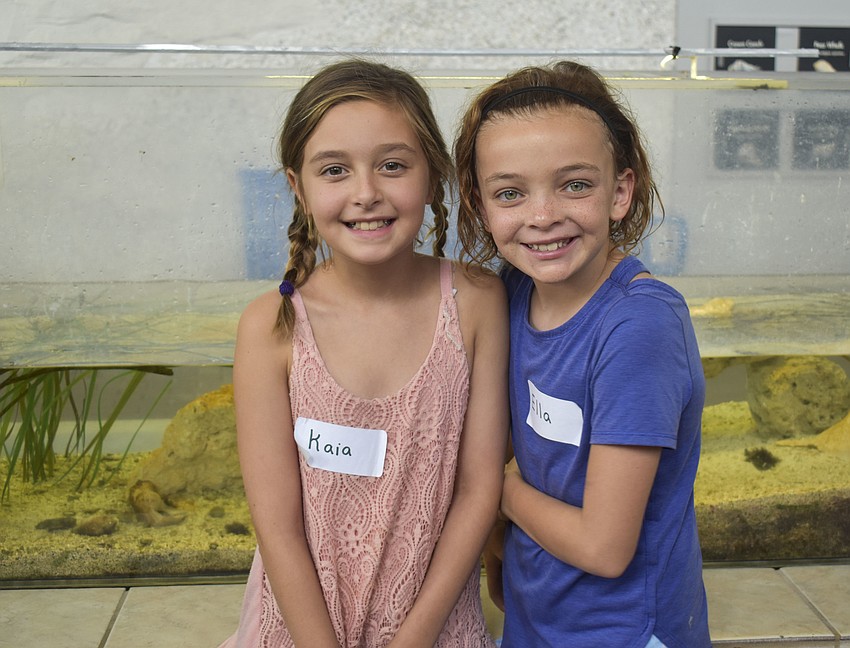 Kaia Mulock and Ella Handlin enjoy their time in the Florida’s Bay Habitats exhibit.