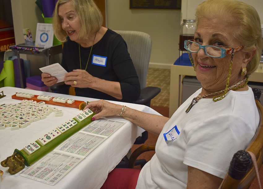 Carole Shaw shows off her mahjong combination.