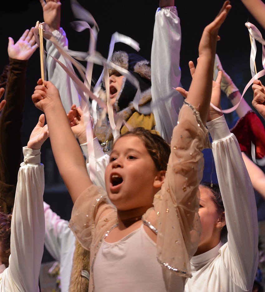 Ashlyn McBride let's her song rip with the Snow Chorus.