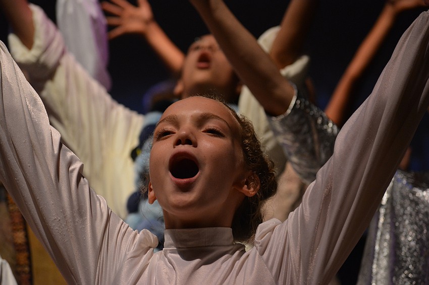 Amber DePasquale sings as a member of the featured Snow Chorus.